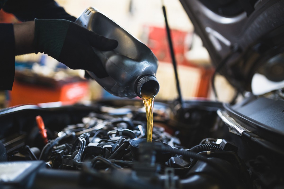 Oil being poured into a diesel vehicle