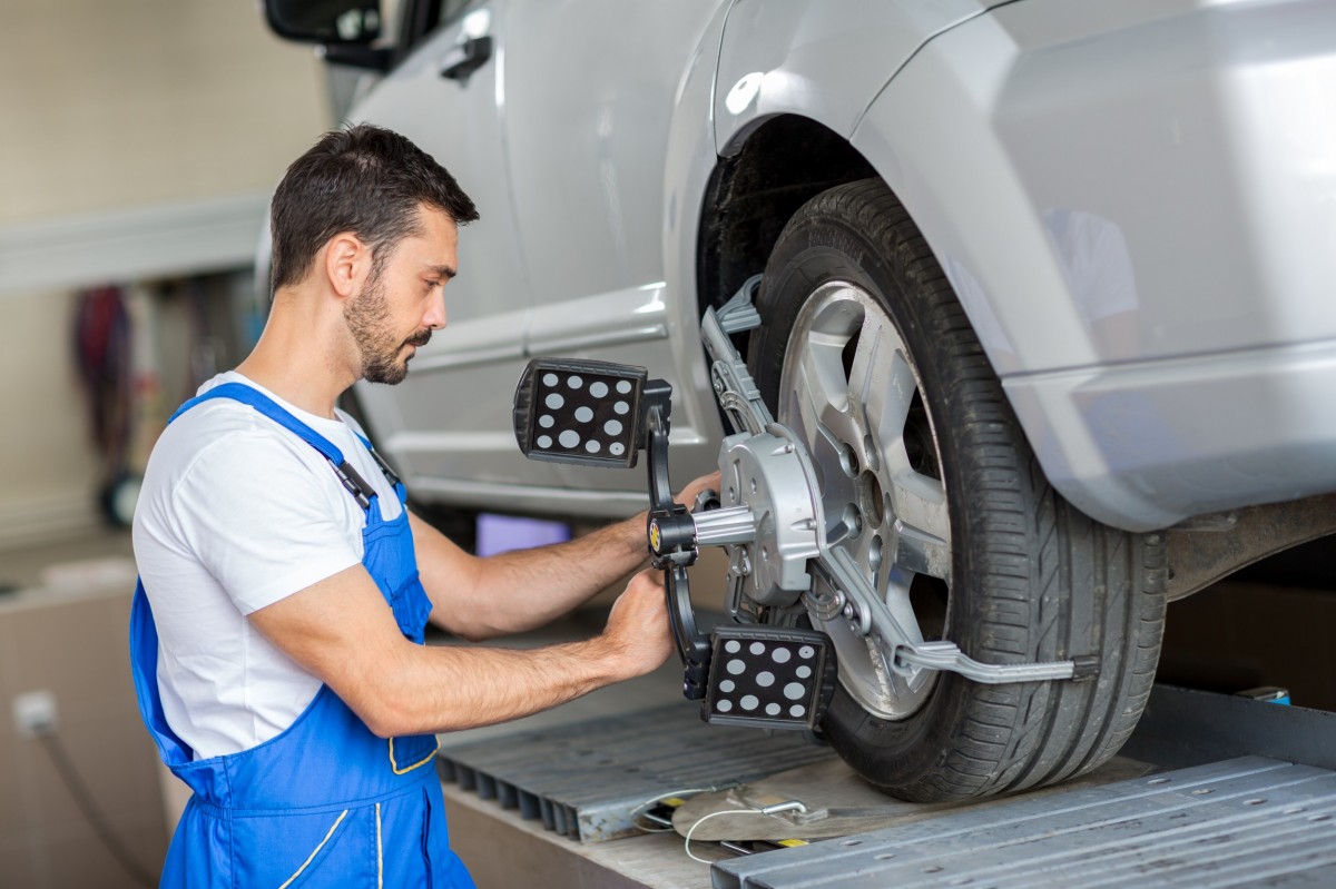 vehicle alignment photo with technician