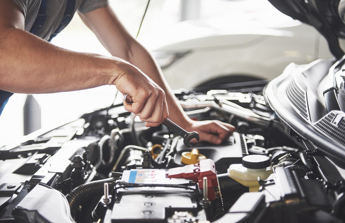 mechanic working on a vehicle