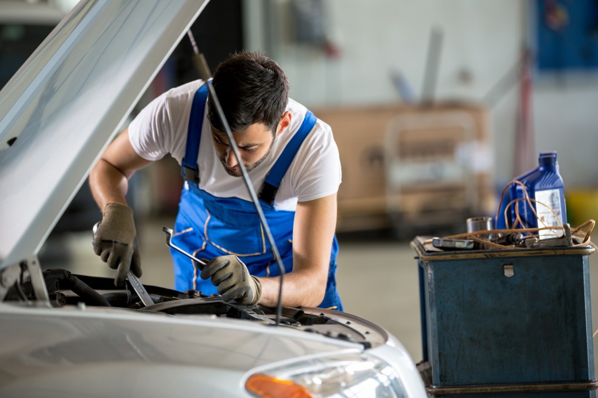 mechanic working on a vehicle